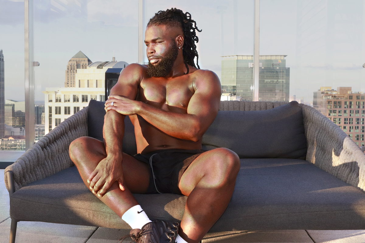 Rooftop seated against the city.